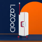 White Hard Shell Travel Suitcase with Red Accents