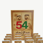 Order the Historic National Day Commemorative Plaque from Lazood online store. Desktop display featuring replica historic UAE newspaper articles.