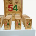 Order the Historic National Day Commemorative Plaque from Lazood online store. Desktop display featuring replica historic UAE newspaper articles.