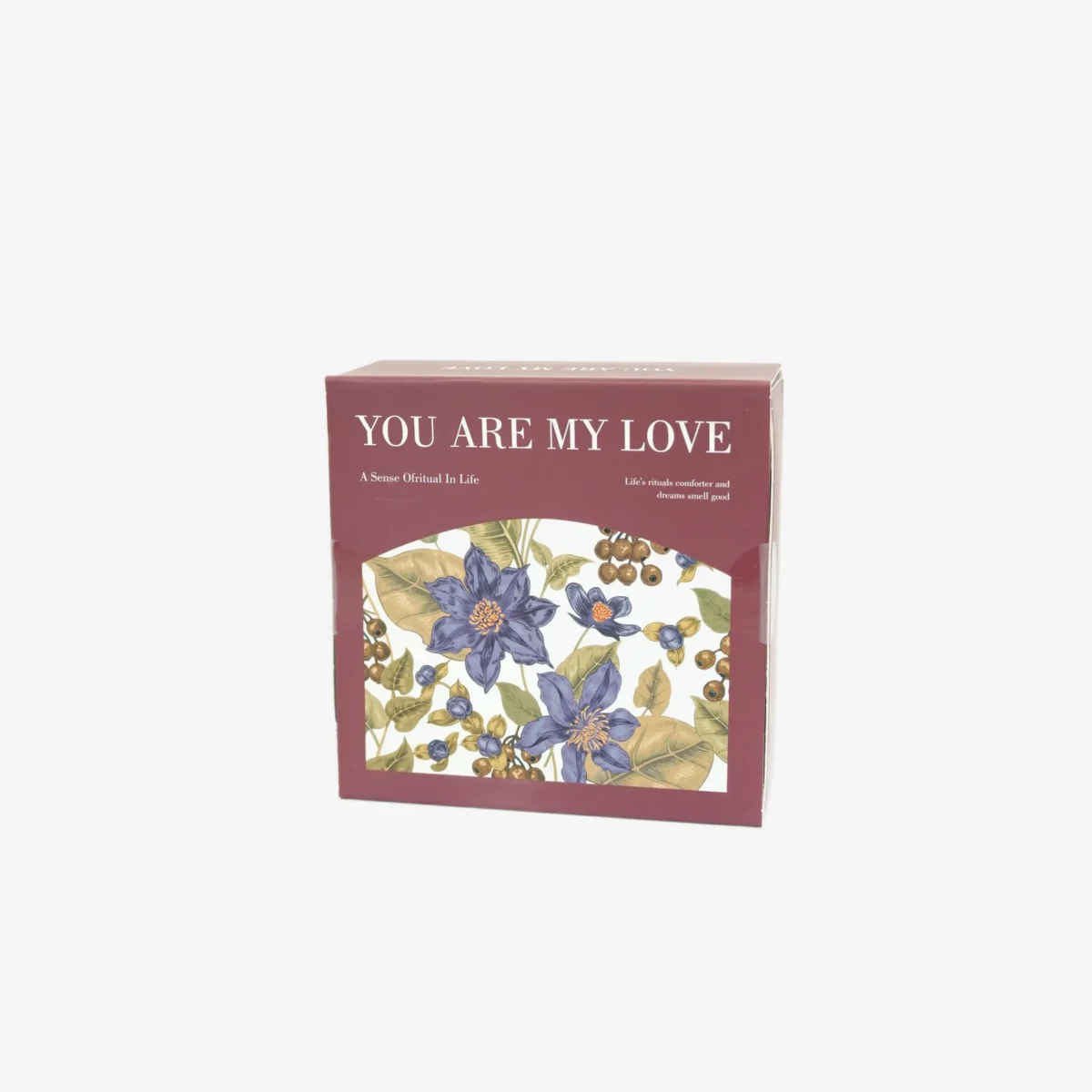 شنطة هدايا تحتوي على علبة شموع فواحة بأشكال مختلفة مع كارت تهنئة لعيد الحب